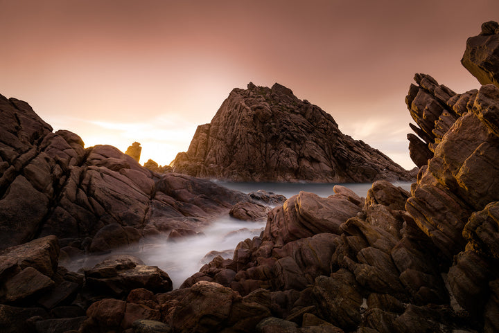 Sunset sky over Sugarloaf Rock at Cape Naturaliste in the South West of Western Australia