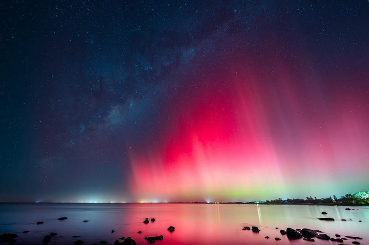 Dunsborough auroras from massive solar geomagnetic storm