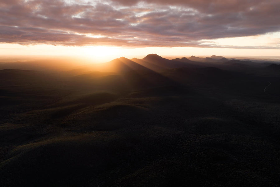 The orange glow of sunrise over the Stirling Range